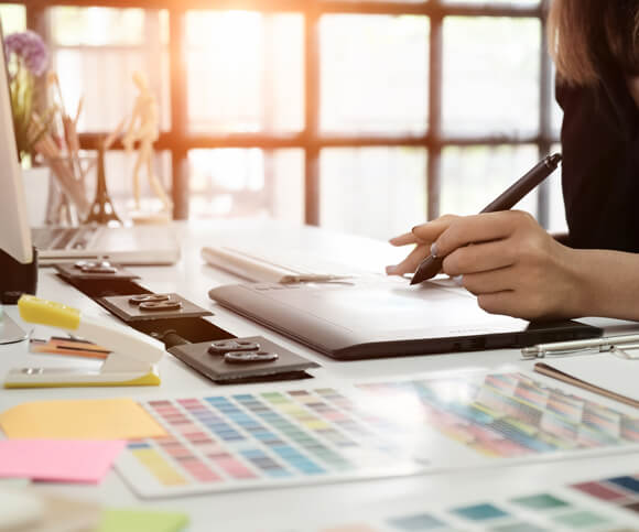 Graphic designer at work in a studio